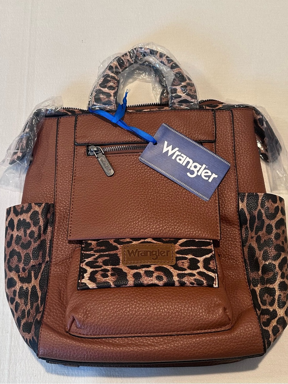 Wrangler Tan and Leopard Print Backpack.  Straps can be worn multiple ways. NWT